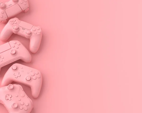 Juego de joysticks o gamepads mentirosos sobre fondo rosa —  Fotos de Stock