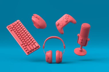 Fare, klavye, joystick, kulaklık, VR kulaklık gibi uçan tek renkli dişliler. Mavi ve pembe masa arkaplanındaki mikrofon. Canlı yayın konsepti üst görünümü için 3d aksesuar hazırlama