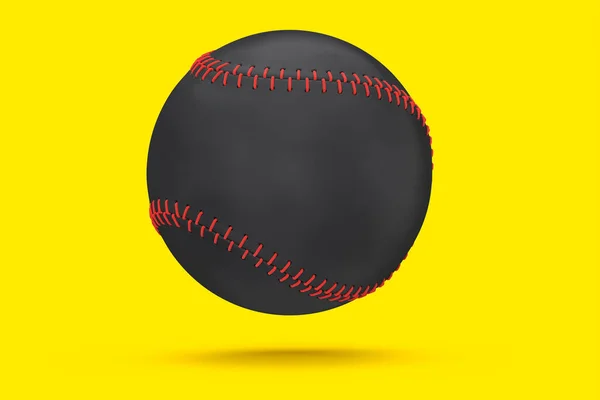 Black softball or baseball ball isolated on yellow background. — Stock Photo, Image