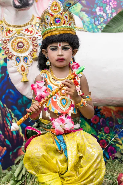 Barn utkledd som lord Krishna lagerfoto – stockfoto