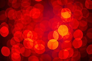 Parlak kırmızı ve sarı yumuşak odaklı ışıklar yanıp sönüyor..