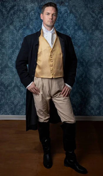 Handsome Regency Man Wearing Gold Waistcoat Breeches Black Jacket Standing — Stock Photo, Image