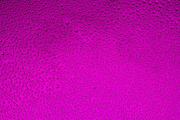 Drops of water on a colorful background — Stock Photo, Image