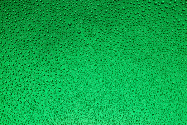 renkli arka plan üzerinde Su damlacıkları