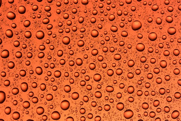 Drops of water on a colorful background — Stock Photo, Image