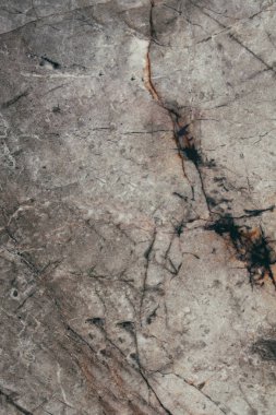 Kahverengi mermer arka plan ve doku. Dikey fotoğraf. 