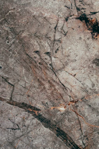 Kahverengi mermer arka plan ve doku. Dikey fotoğraf. 