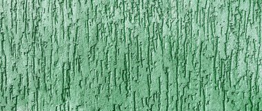 Yüzeysel desenli alçı duvarlar yeşil renk. Panorama. Pankart.