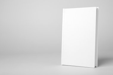 Gri arka plan üzerinde gerçek beyaz kitap