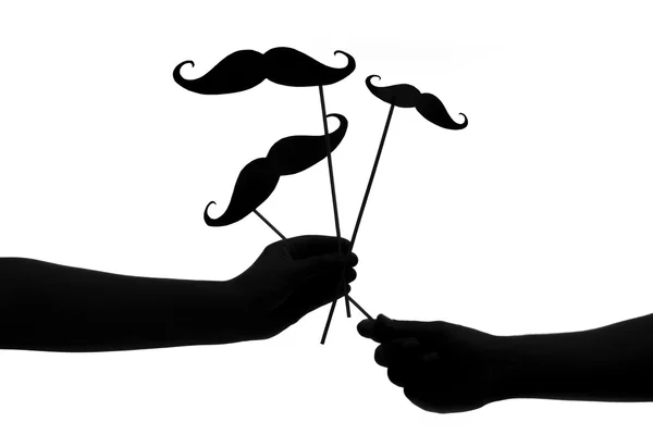 Bıyıklar sopa üzerinde tutan eller silüeti