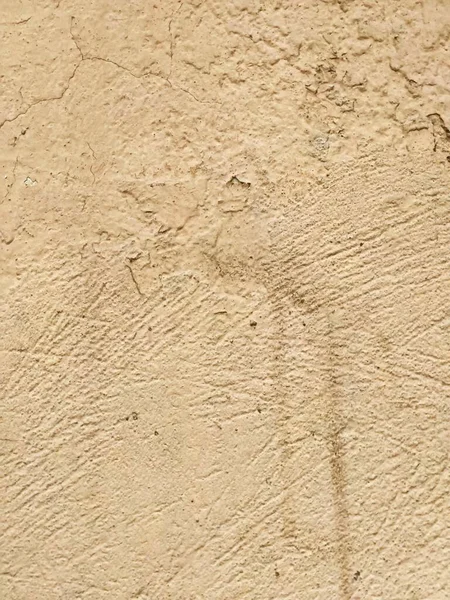 Kaba bej duvar yüzeyinin makro dokusu