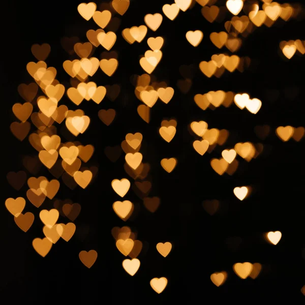 金の背景ボケライトハート バレンタインの背景 夜の背景のためのぼやけた輝き 愛の旗 をテーマに 肯定的な感情 お祝いと愛の概念 — ストック写真