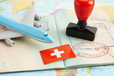 Switzerland,passport with approved stamp on document for tourism to immigration at airport in country.