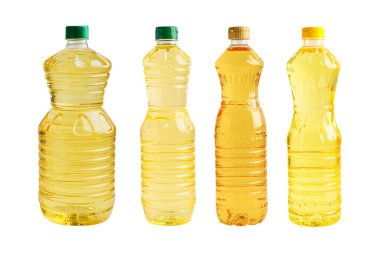 Şişedeki sebze yağı beyaz arka planda izole edilmiş..