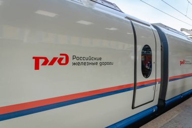 Saint Petersburg, Russia - May 2019: Russian Railways train at the platform in Saint Petersburg Moscau train station. Russian Railways is a Russian state-owned railway. clipart