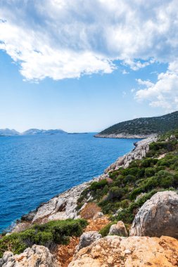 Lycian way hiking and trekking route with sea view in Turkish Mediterranean area with rocks, mountains. Mountain landscape image taken on the Lycian way hiking trail near Kas, Turkey.