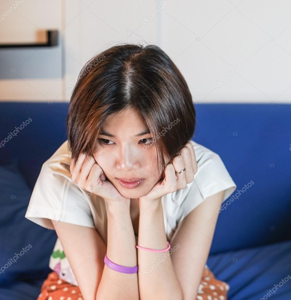 Cute Short Hair Asian Teenagers Look Sad And Bored Stock Photo