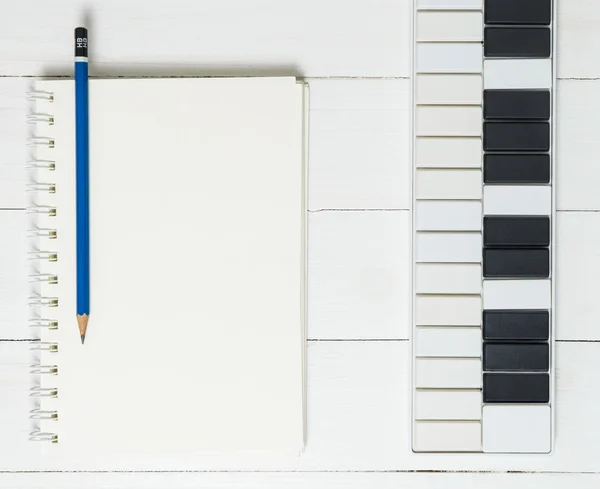 Blank Notebook Music Keyboard. Song writing