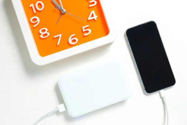Time to charge smart phone with power bank — Stock Photo, Image