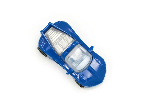 Jouet de voiture minuscule en plastique bleu isolé sur fond blanc — Photo