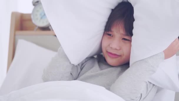 Asian Boy Using Pillow Cover His Eye Ear Noise Nightmare — Stock Video