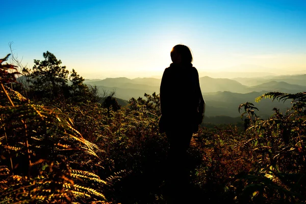 stock image Hiker asian woman happy feeling freedom good and strong weight victorious facing on the natural mountain. Travel Concep