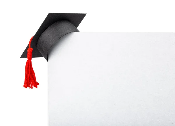 Graduate hat on the corner of paper banner. Mock-up isolated on white background — Stock Photo, Image