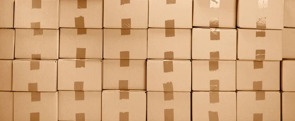 Caixas de papelão textura para entrega ou em movimento. Pilha de caixas — Fotografia de Stock