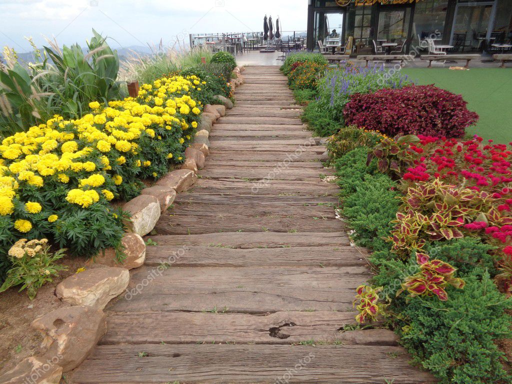 Colorful Flower Bed Along The Wooden Walkway Of Front Yard Colorful Flower Bed Along The Wooden Walkway Of Front Yard Photo By Worldtravelers Clashot