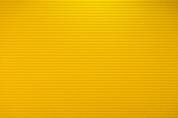 Close-up de textura de papel amarelo com linhas em relevo — Fotografia de Stock