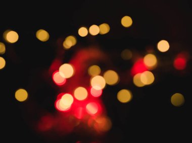 Sıcak renkli ışıklarla bulanık bokeh arkaplan resmi.
