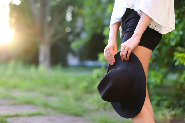 Female hat lovely sunset image of the sun legs — Stock Photo, Image