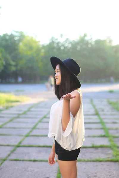 Wonderful female hat asian sunset — Stock Photo, Image