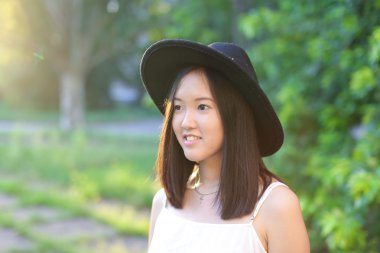 harika kadın şapka Asya günbatımı