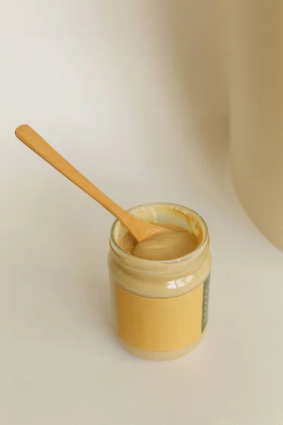 Textura zavřít mandlové máslo nebo arašídové máslo — Stock fotografie