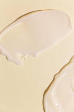 Tarafsız arkaplanda kozmetik krem dokusu