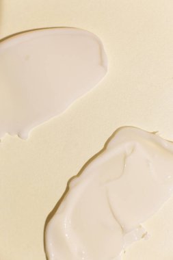 Tarafsız arkaplanda kozmetik krem dokusu