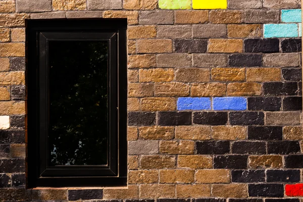 Colorful bricks decorate on the wall.