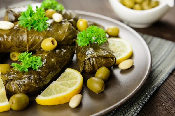 Dolma - stuffed grape leaves with rice and vegetable — Stock Photo, Image
