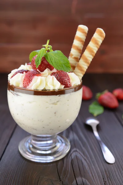 Stracciatella cream with whipped cream, chocolate and strawberries — Stock Photo, Image