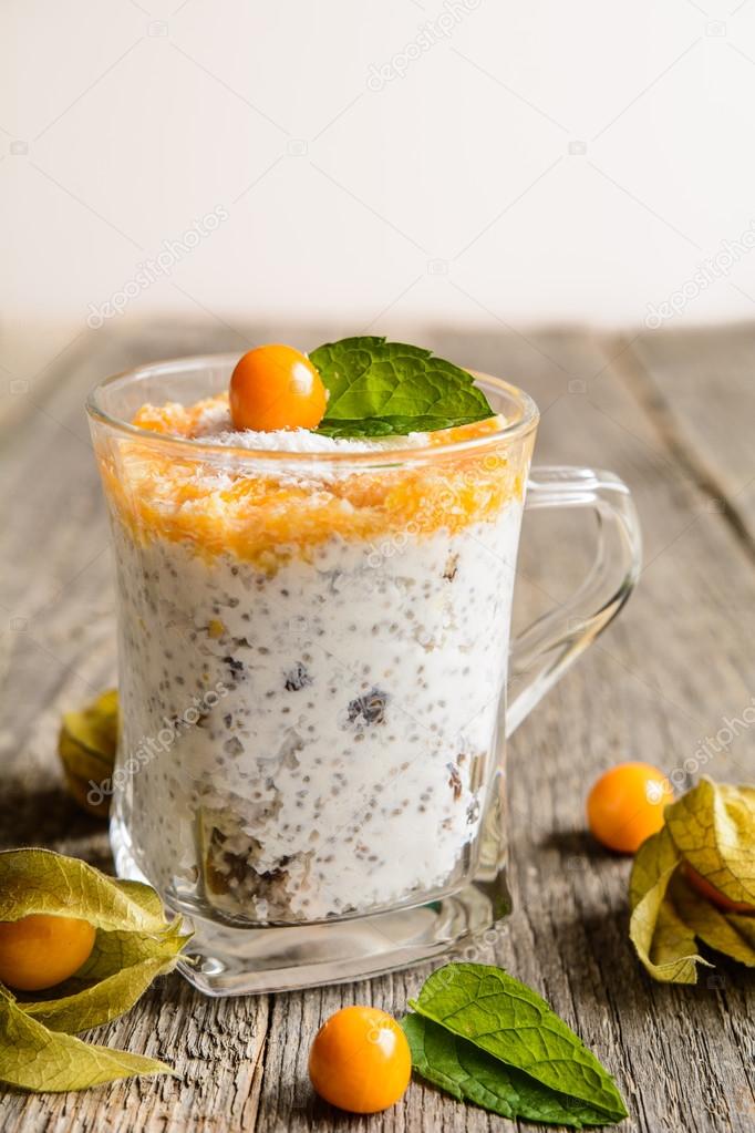 Yogurt with chia, coconut, honey and physalis puree