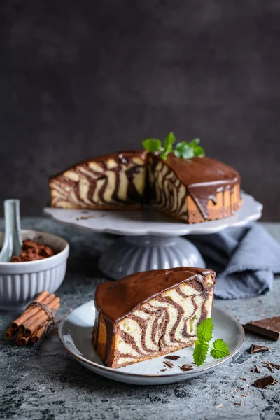 Homemade Zebra marble cake with chocolate glaze
