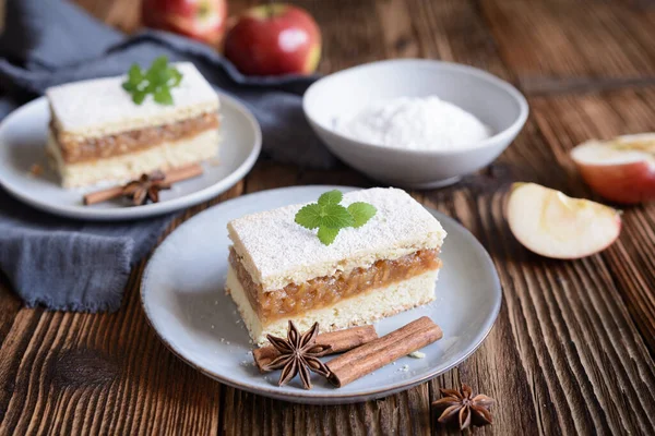 Linzer cinnamon apple pie slices with powdered sugar icing