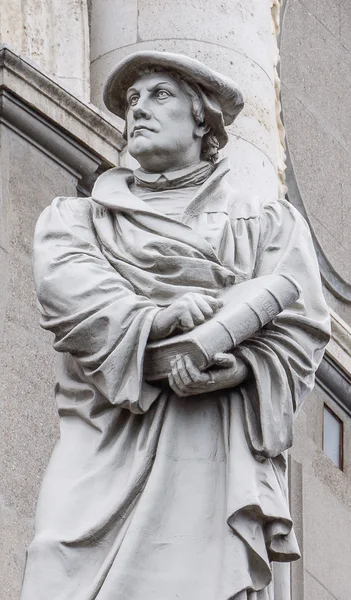 Monument of the reformer Martin Luther in front of Marble church — Stock Photo, Image