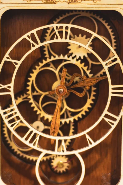 Gears and hands of wooden mechanical watches.