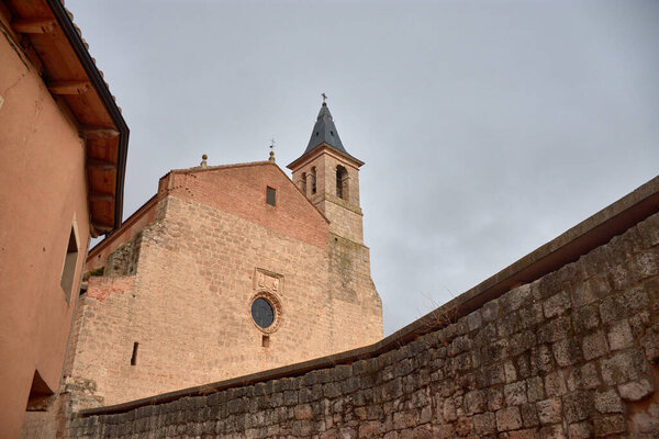 The sober and monumental facade of the Monastery of San Francisco in Medina de Rioseco, constructed of light-colored, warm-toned ashlar stone, reflects Castilian classicism. 