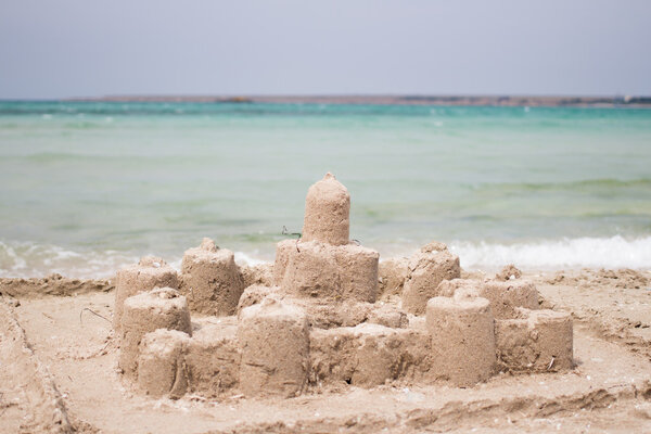 Sand castle on the beach
