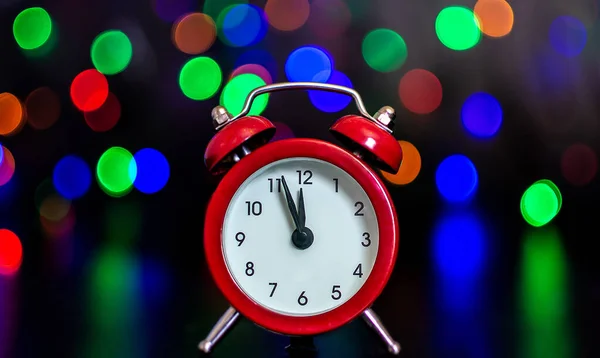 Clock Hands Shows Five Minutes Midnight Background Colored Lights Bokeh — Fotografia de Stock