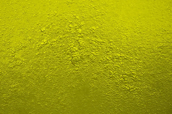 Törött festék textúra. Absztrakt sárga háttér pattanásokkal. Művészet, illusztráció, grunge, modern, poszter. — Stock Fotó
