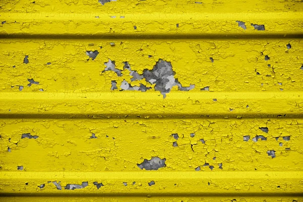 Törött festék textúra részlet. Repedt pelyhes sárga festék, háttér textúra — Stock Fotó